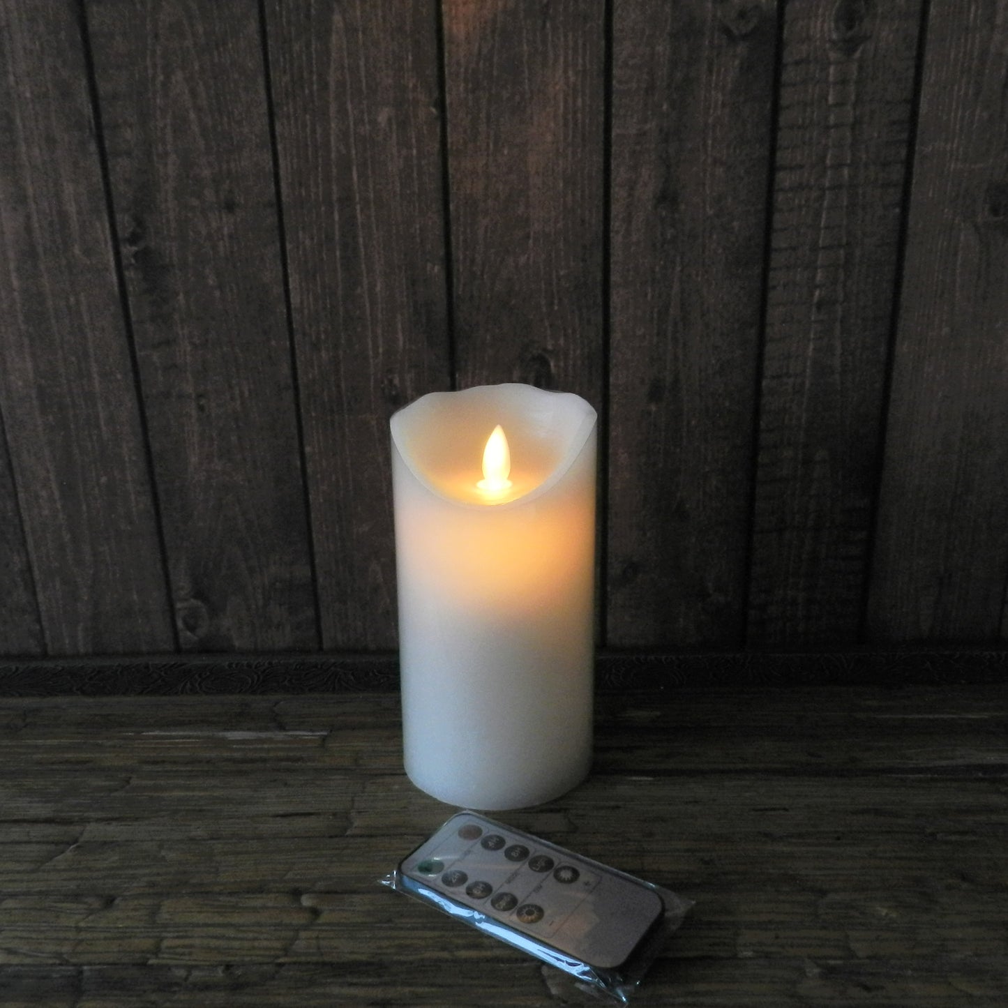 CVHOMEDECO. Dancing Flame Wax Pillar LED Candle with Remote Control, 3.25 X 6 Inch, Ivory