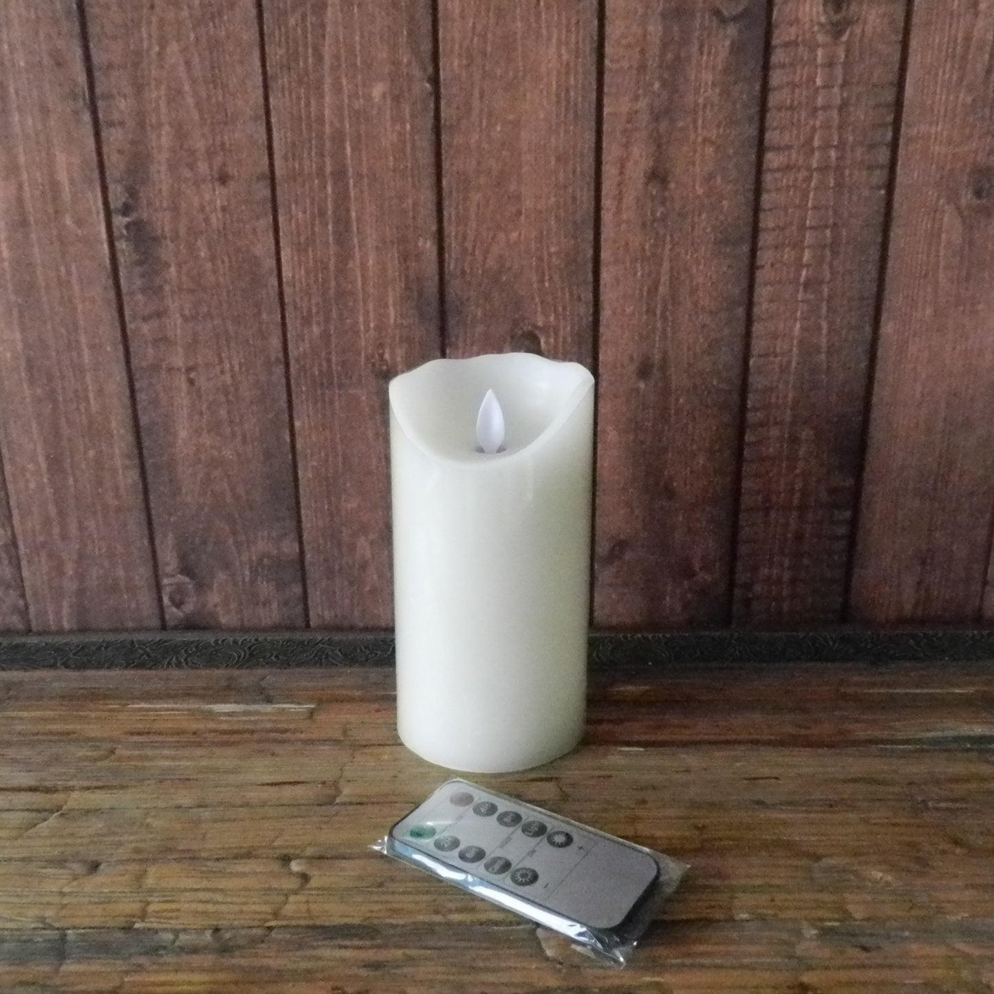 CVHOMEDECO. Dancing Flame Wax Pillar LED Candle with Remote Control, 3.25 X 6 Inch, Ivory