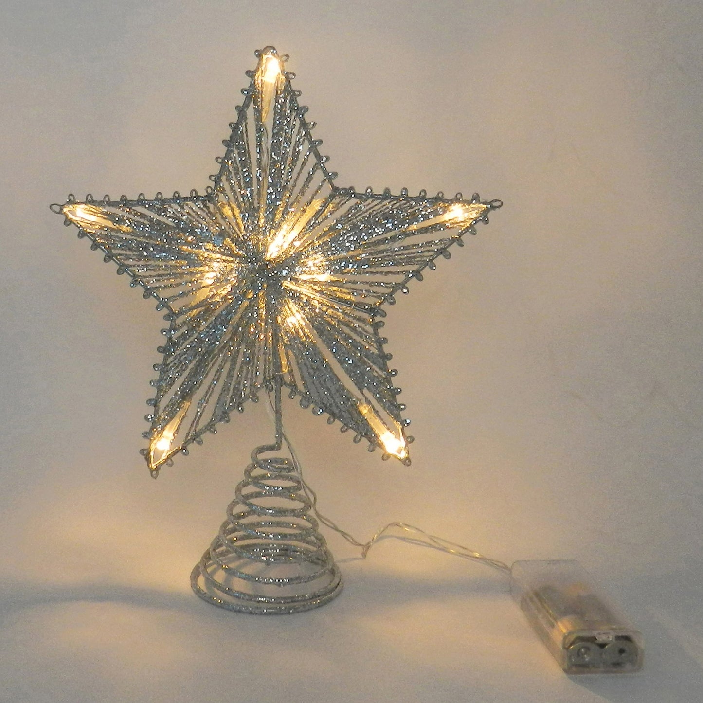 CVHOMEDECO. Silver Glittered Tree Top Star with Warm White LED Lights for Christmas Ornaments and Holiday Seasonal Décor, 8 x 10 Inch