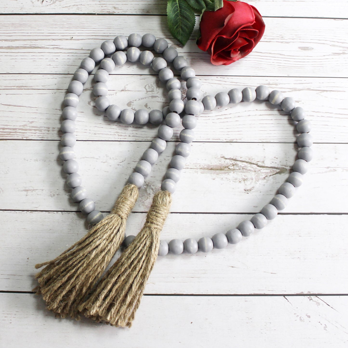 CVHOMEDECO. Wood Beads Garland with Tassels Farmhouse Rustic Wooden Prayer Bead String Wall Hanging Accent for Home Festival Decor. Grey Distressed